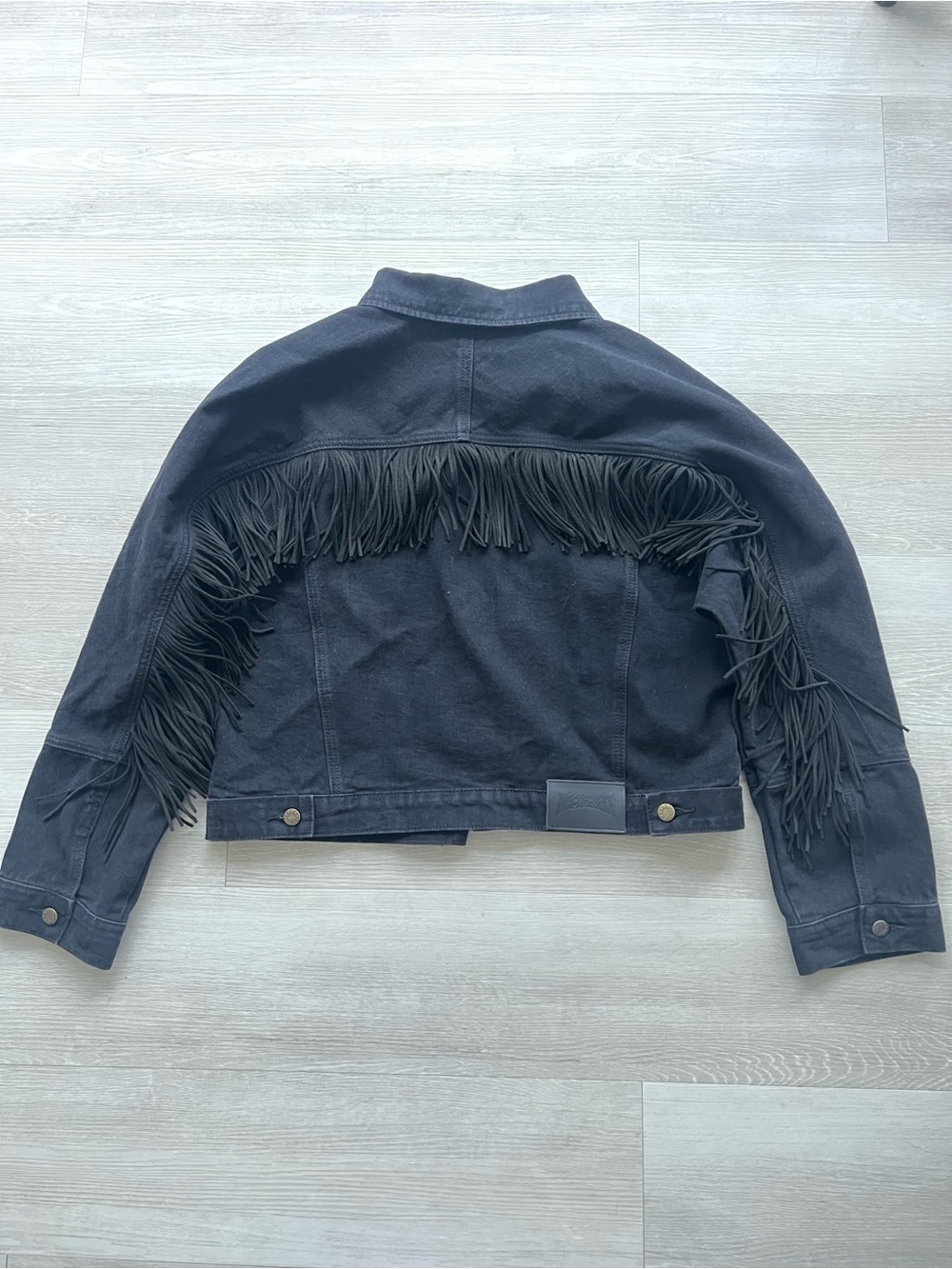 Fringe denim jacket by ArtcareShop. New, size XL.